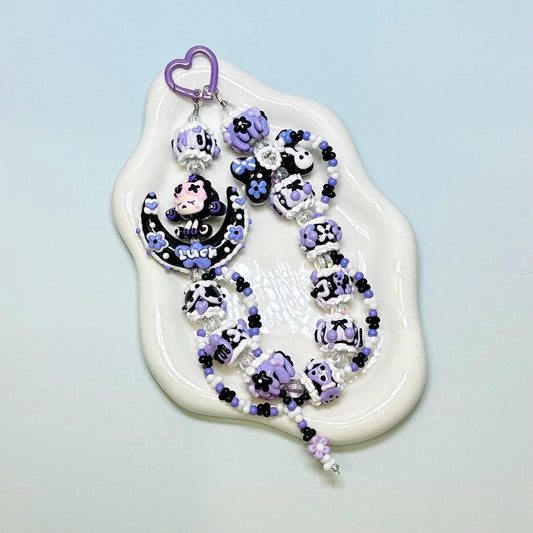 Purple and black SkullPanda inspired Hand Painted Phone Strap | Bag Charm